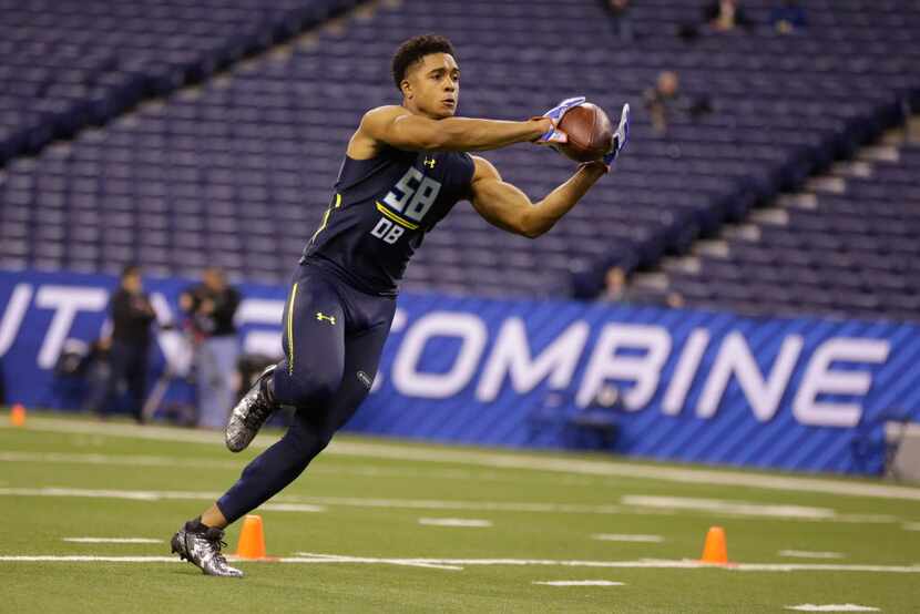 Florida defensive back Quincy Wilson runs a drill at the NFL football scouting combine in...