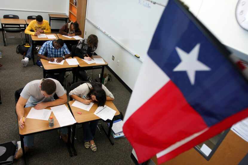 Students work on a practice end-of-course English test for the STAAR. Some districts are...