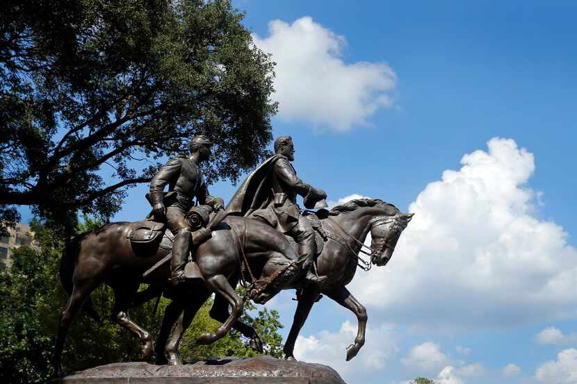 The Robert E. Lee statue in Robert E Lee Park is pictured in the Turtle Creek area of...