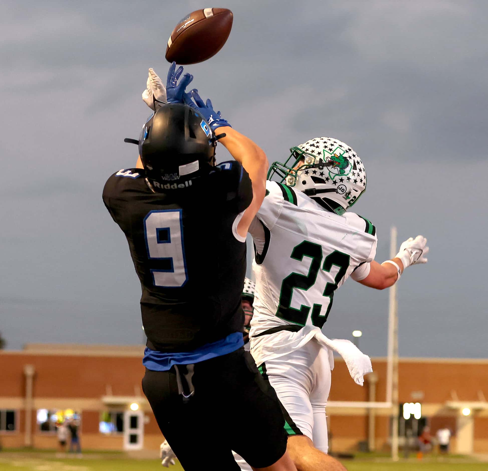 Southlake Carroll defensive back Mitchell Paulsen (23) defends a pass intended for Byron...