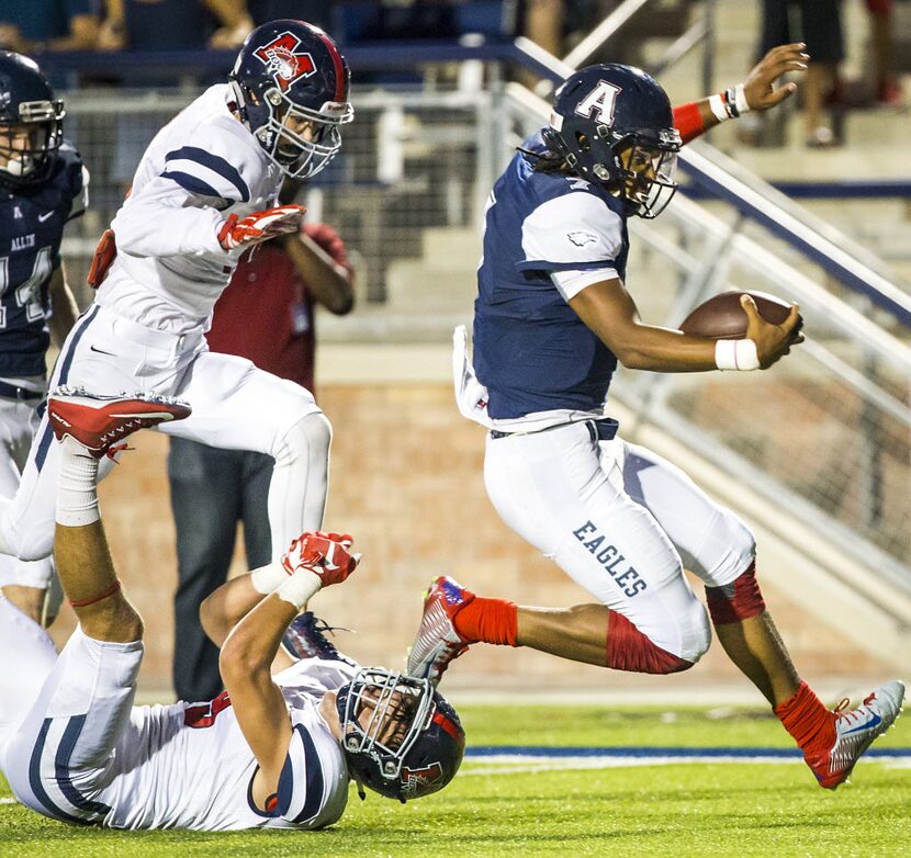 Allen quarterback Seth Green gets past the McKinney Boyd defense on a 33-yard touchdown run...