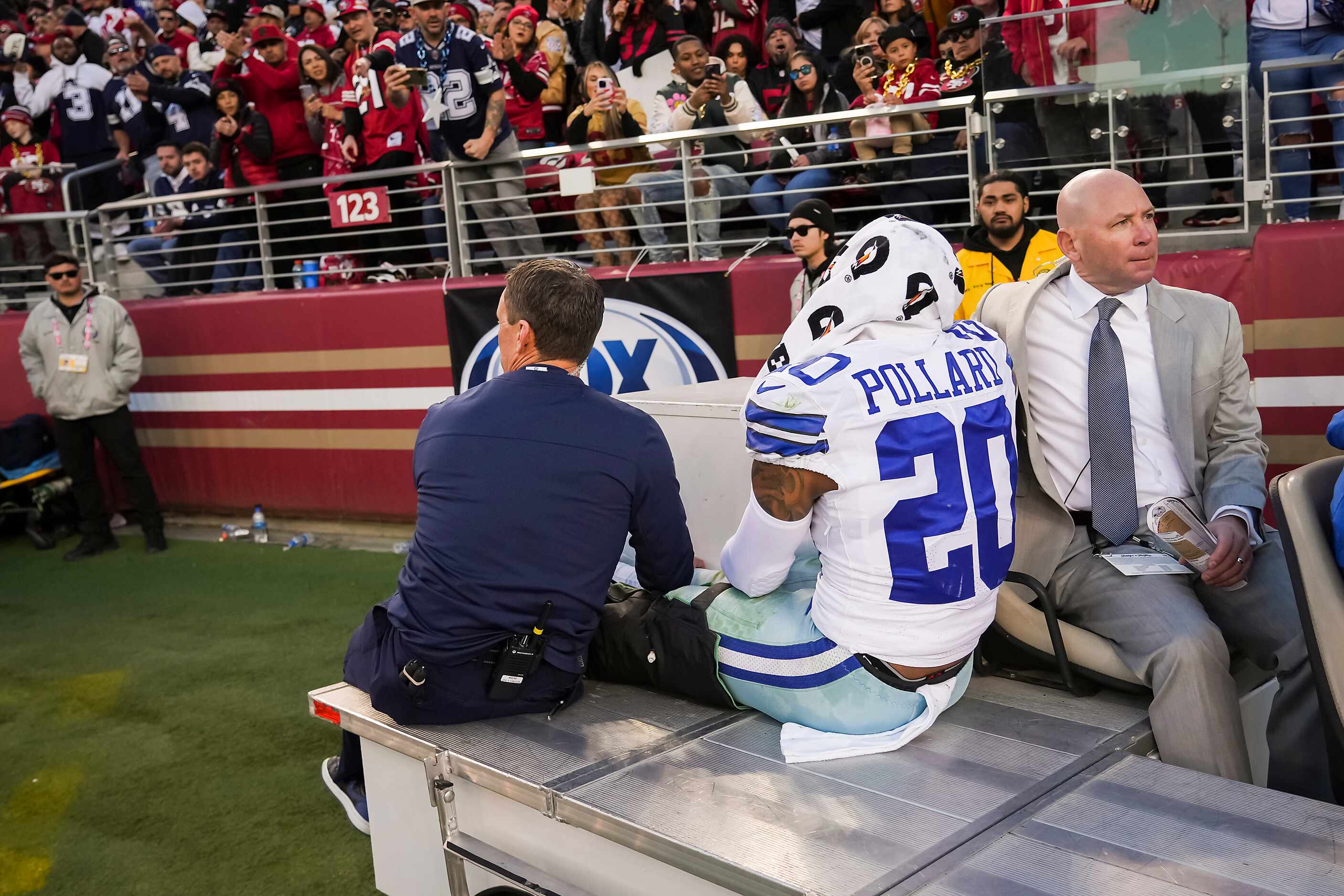 Dallas Cowboys running back Tony Pollard (20)  leaves the field on a cart after being...