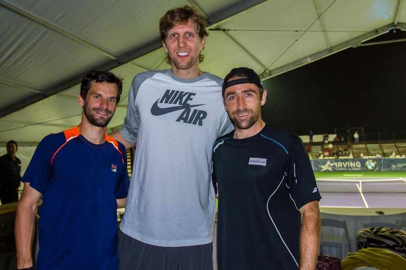 
Dirk Nowitzki visits with tennis players Philipp Petzschner (left) and Benjamin Becker...