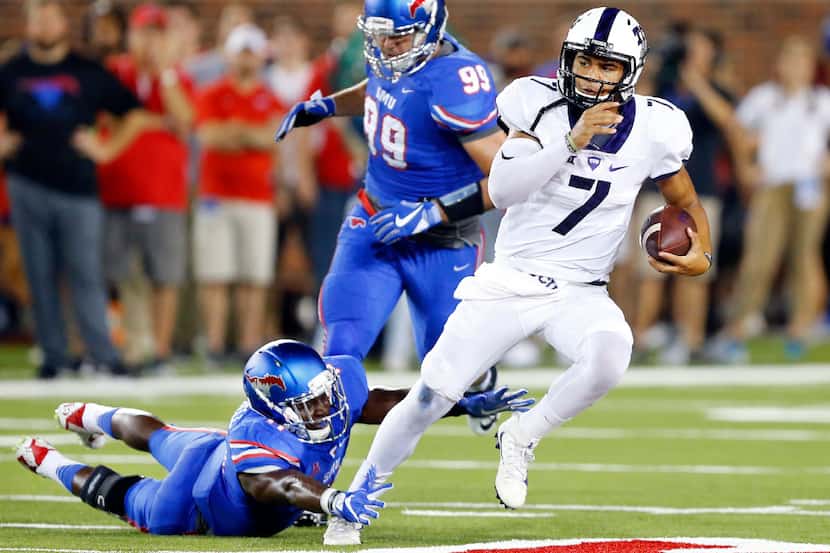 TCU Horned Frogs quarterback Kenny Hill (7) cuts back across midfield away from Southern...