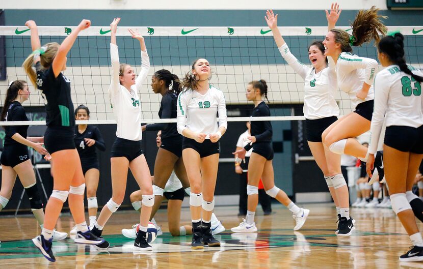 Southlake Carroll players celebrate a second period point against Hebron in their Class 6A...