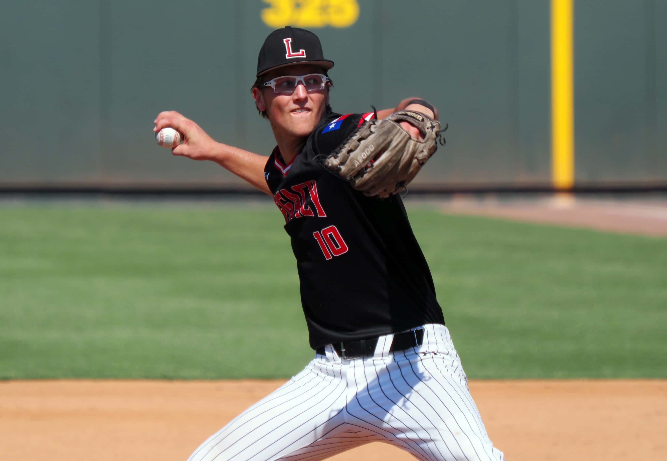 Mansfield Legacy pitcher Blake Julius pitches against Friendswood in the UIL baseball 5A...