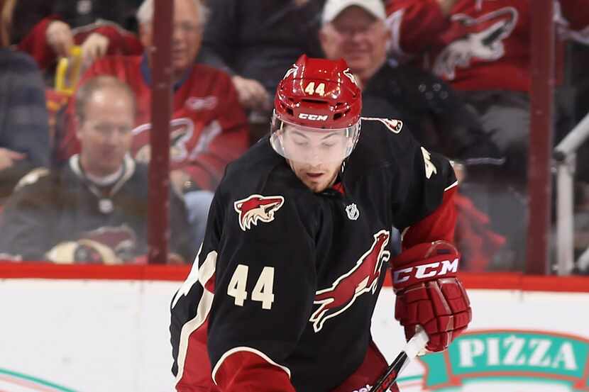 GLENDALE, AZ - MARCH 04:  Chris Brown #44 of the Phoenix Coyotes skates with the puck during...
