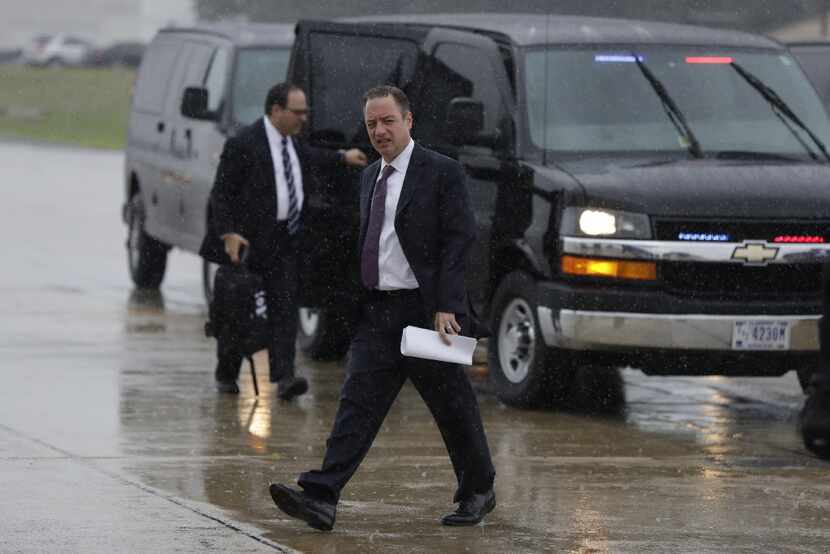 Former White House Chief of Staff Reince Priebus walks to board Air Force One at Andrews Air...