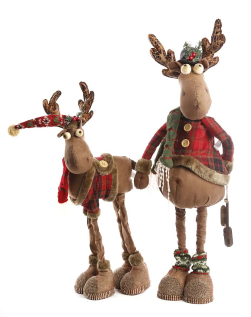 Be a deer: Whimsical reindeer pull Santa’s sleigh wearing cotton-plaid jackets, woolly socks...