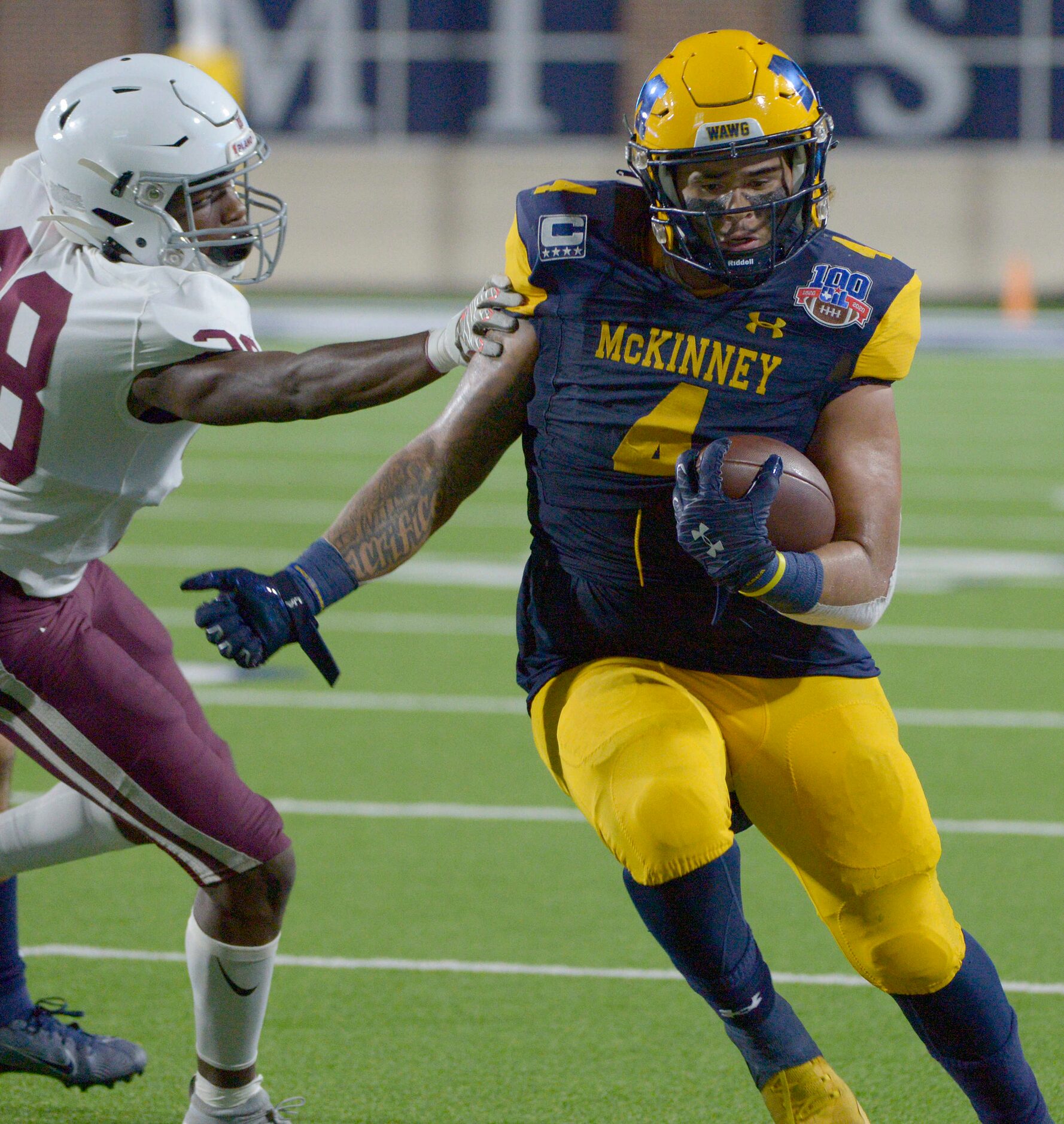 McKinneyÕs Taylor Straughan (4) runs past a tackle attempt by PlanoÕs Jermaine Jamabo in the...