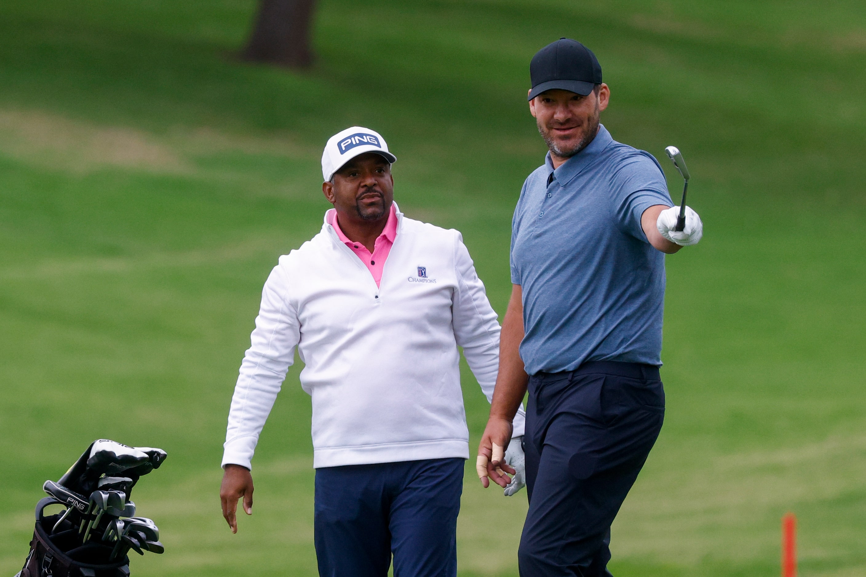 Former Dallas Cowboys quarterback Tony Romo talks with actor Alfonso Ribeiro on the 18th...