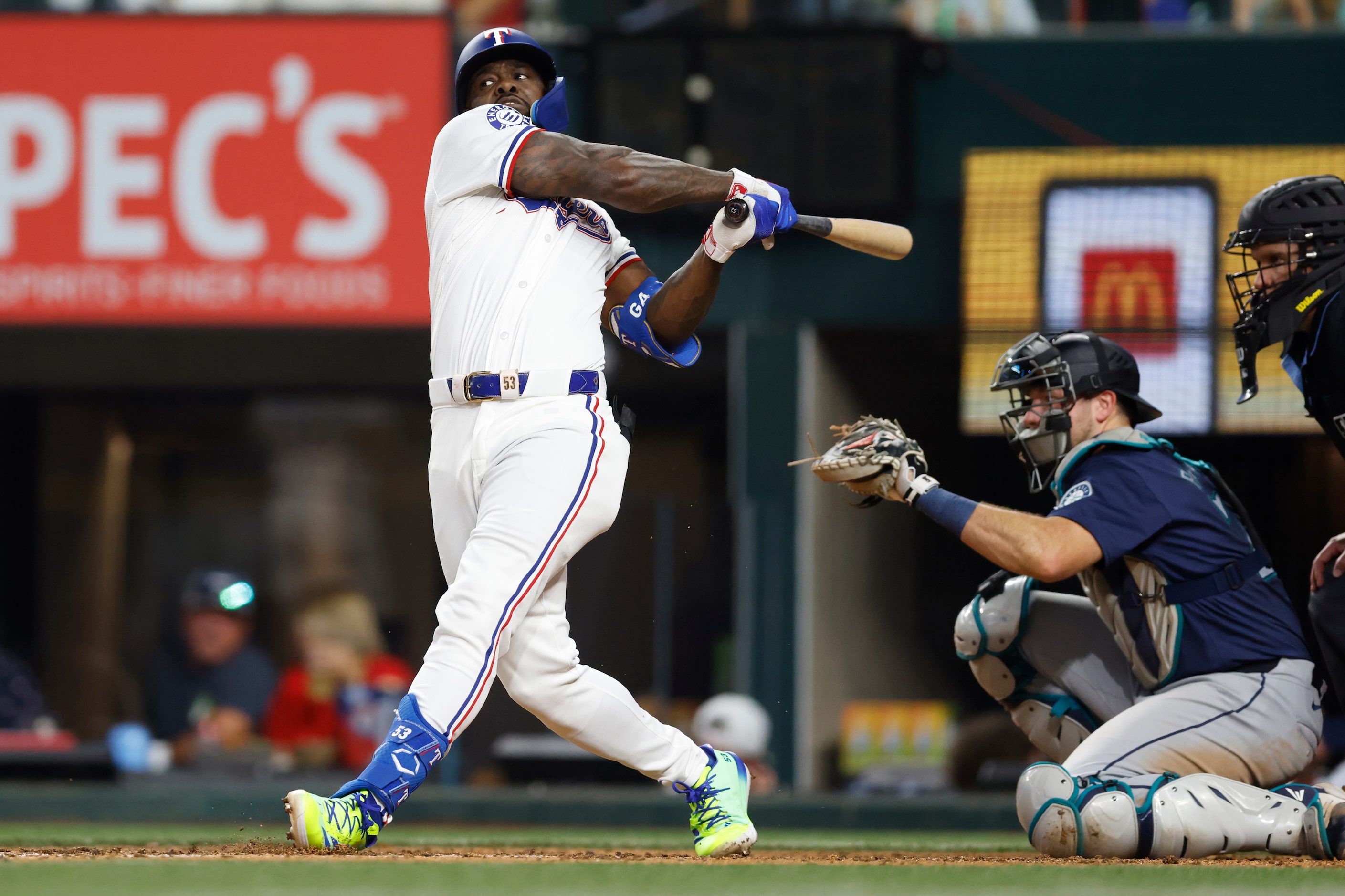 Texas Rangers designated hitter Adolis Garcia (53) strikes out swinging during the sixth...