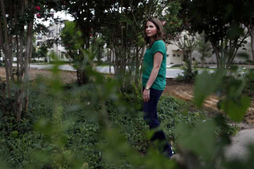 Ashley Green looks around at Capitol and North Garrett avenues, where a year ago she was...
