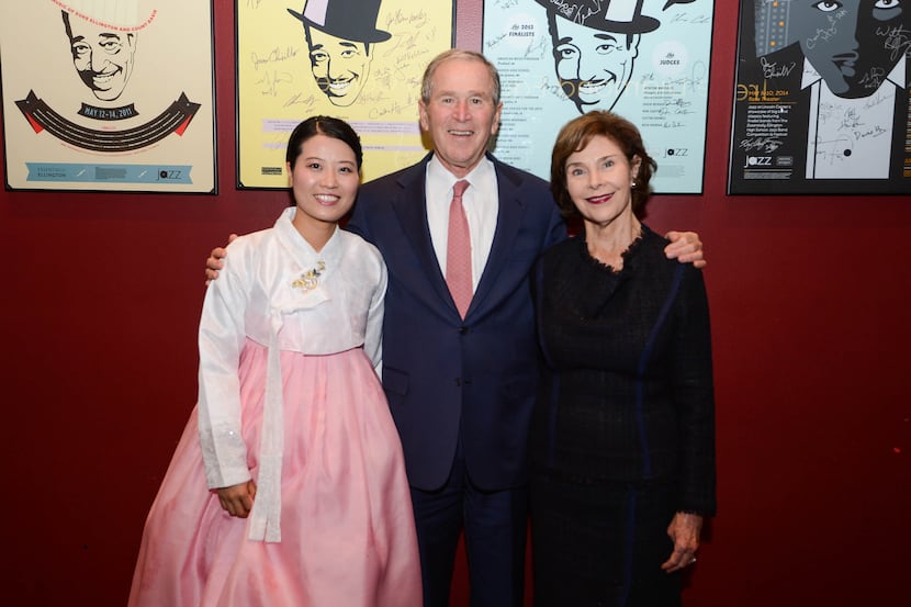From left, Grace Jo, President  George W. Bush and Laura Bush at the GWBPC Spirit of Liberty...