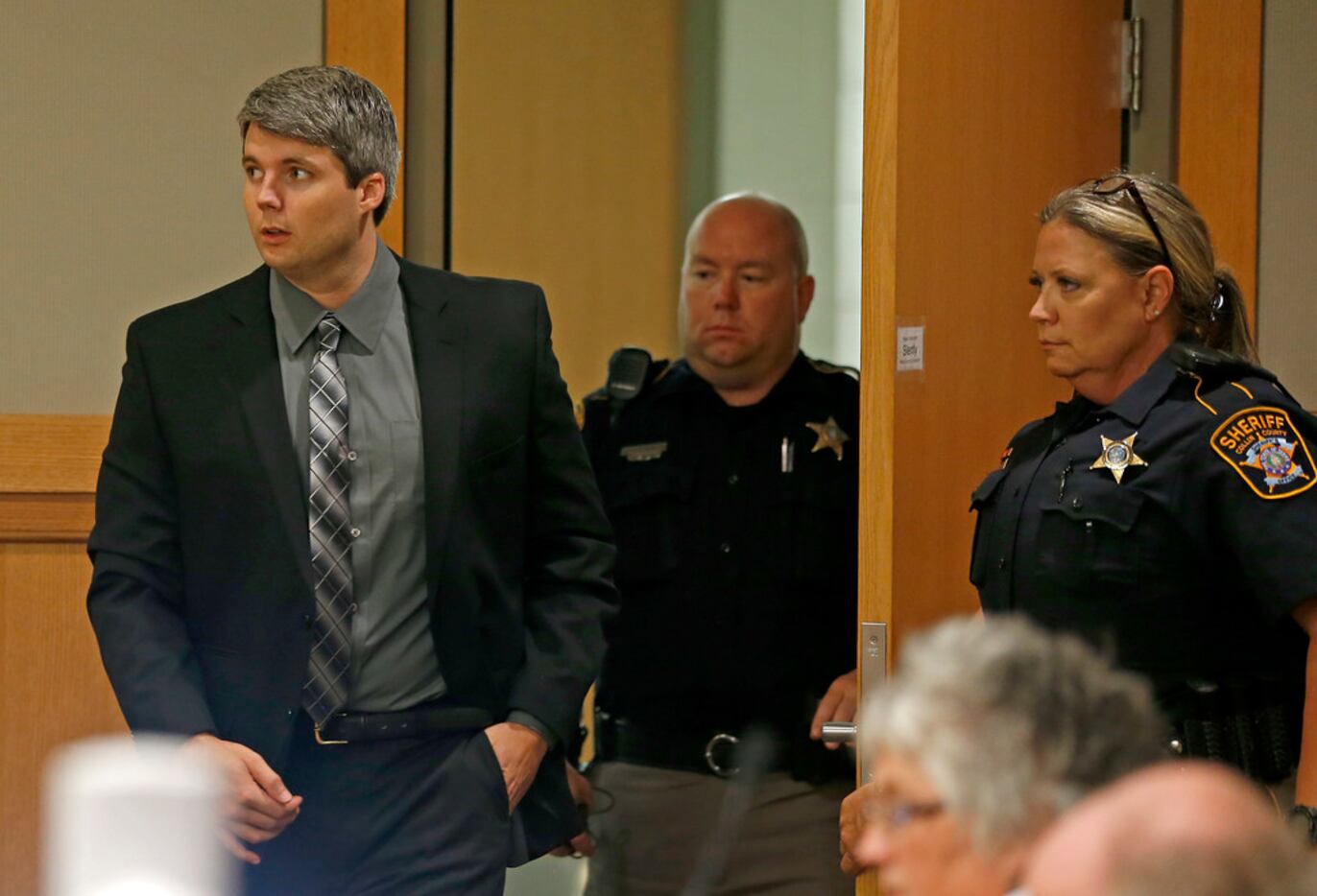 Defendant Jason Lowe enters the courtroom during his murder trial at the Collin County...