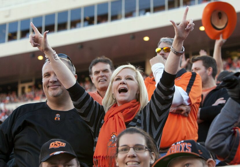 Nov 17, 2012; Stillwater OK, USA; Oklahoma State Cowboys fans cheer during the second...