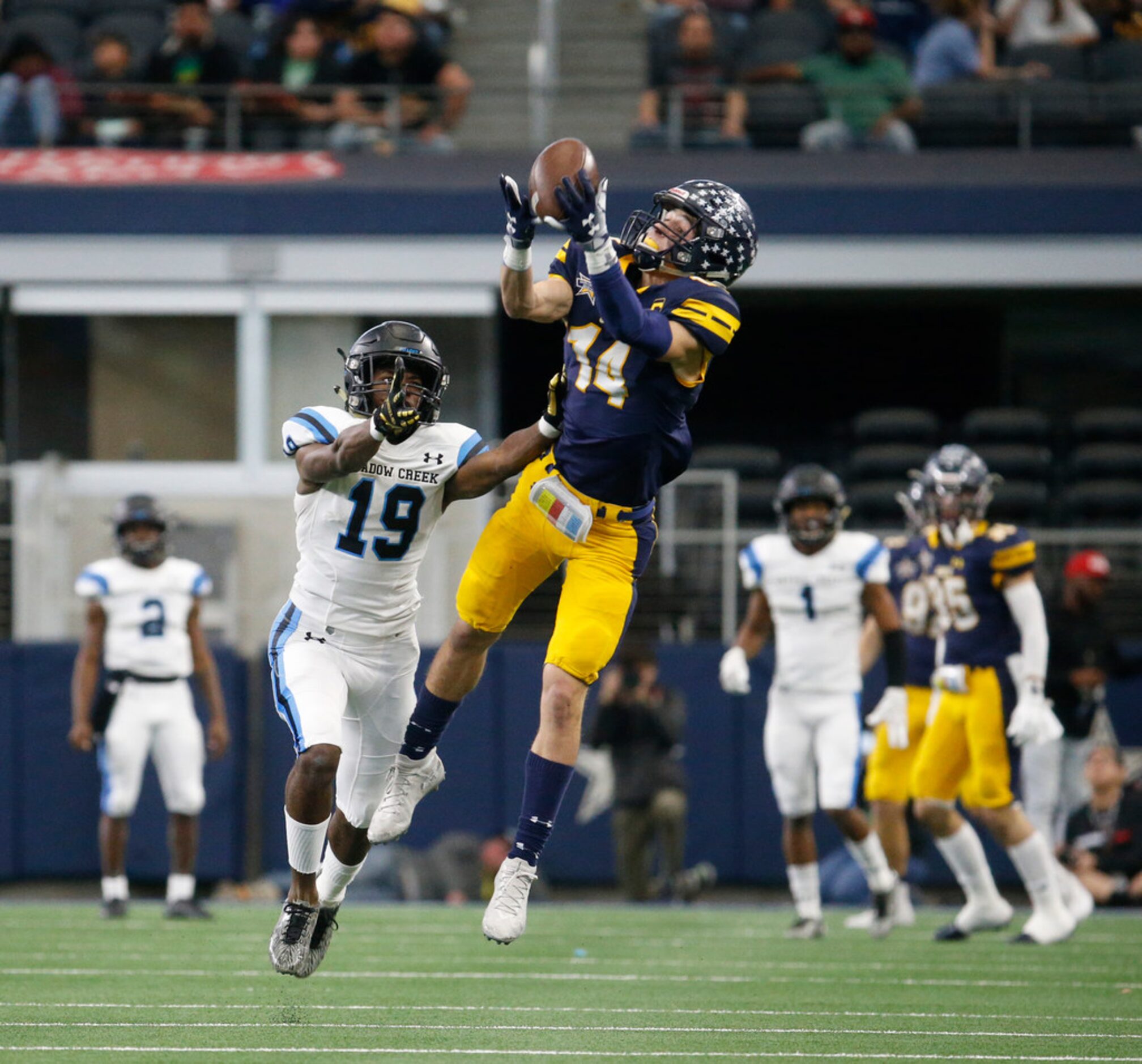 Highland Park's  Hudson Clark (14) intercepts the ball against Shadow Creek's Carlton Guidry...