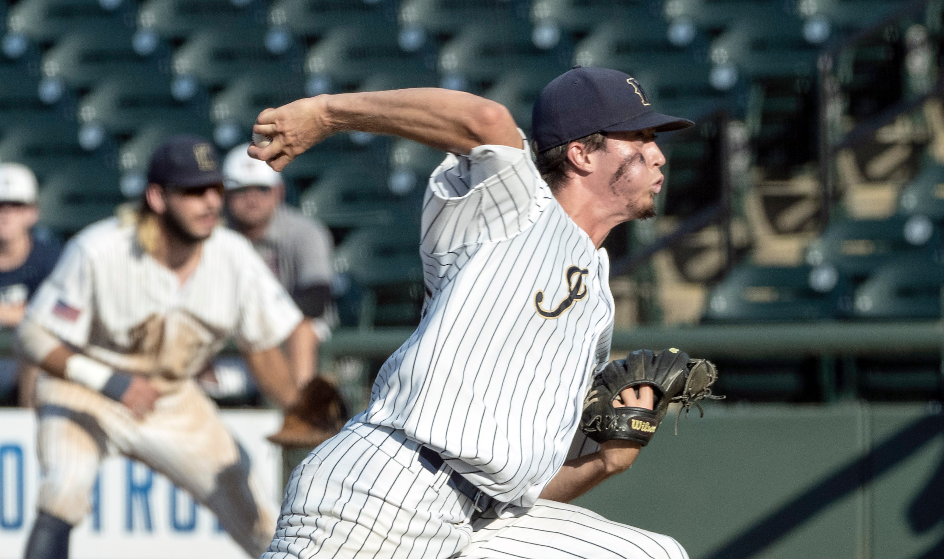 Keller Eric Hammond, (27), pitches against Houston Strake Jesuit during the sixth inning of...