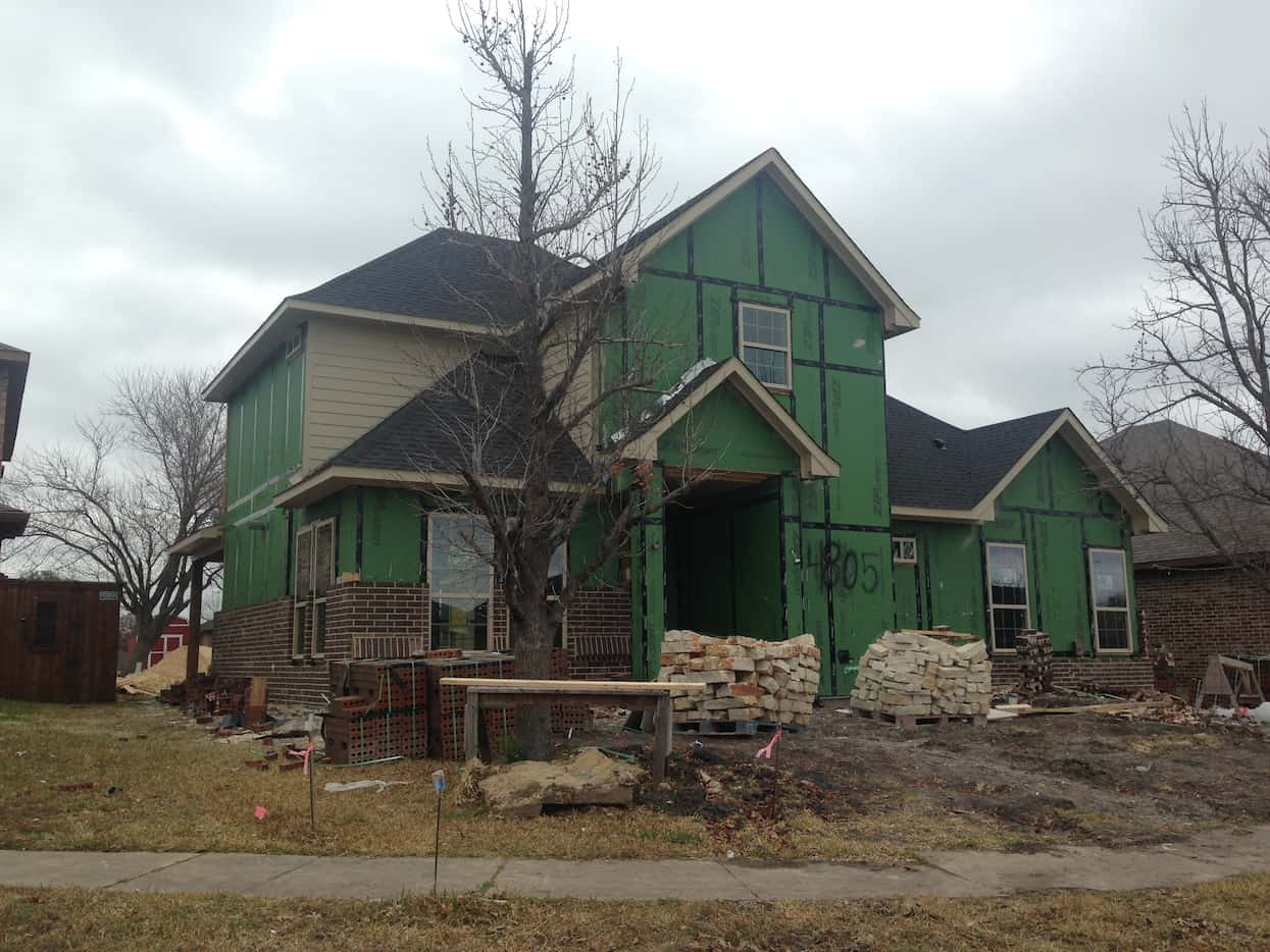 Bricks and exterior finish remained on the rebuild of a single-family residence on...