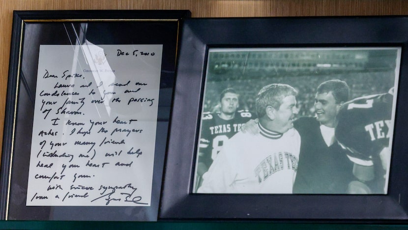 A photo of TCU head coach Sonny Dykes with his father and then Texas Tech head coach Spike...