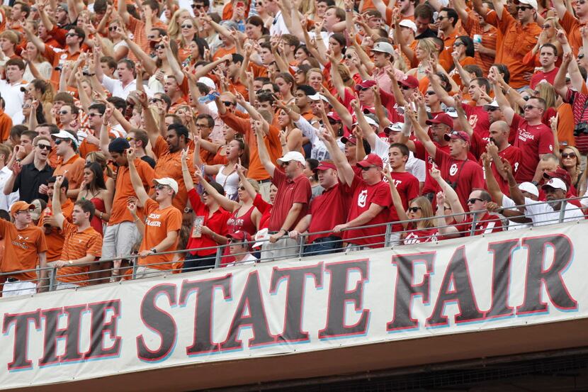 Texas Longhorns and Oklahoma Sooners fans at the Red River Rivalry game between Texas and...
