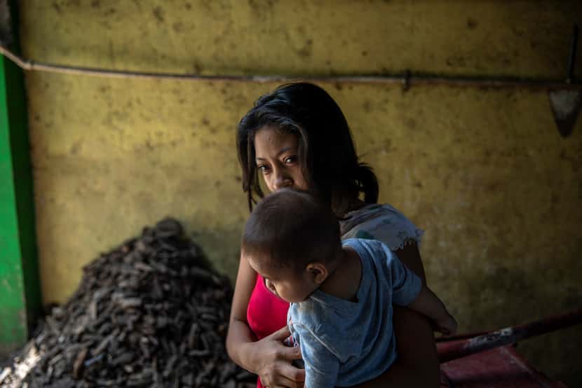 Yolanda Lopez, who fled to Mexico from El Salvador, fearing for her children's safety, in...