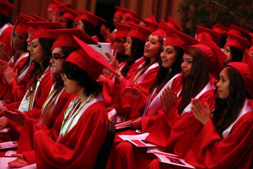 The 2013 graduating class of Irma Lerma Rangel Young Women's Leadership School applauds the...