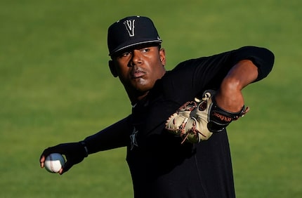 Vanderbilt pitcher Kumar Rocker warms up  before an NCAA baseball game against Mississippi...