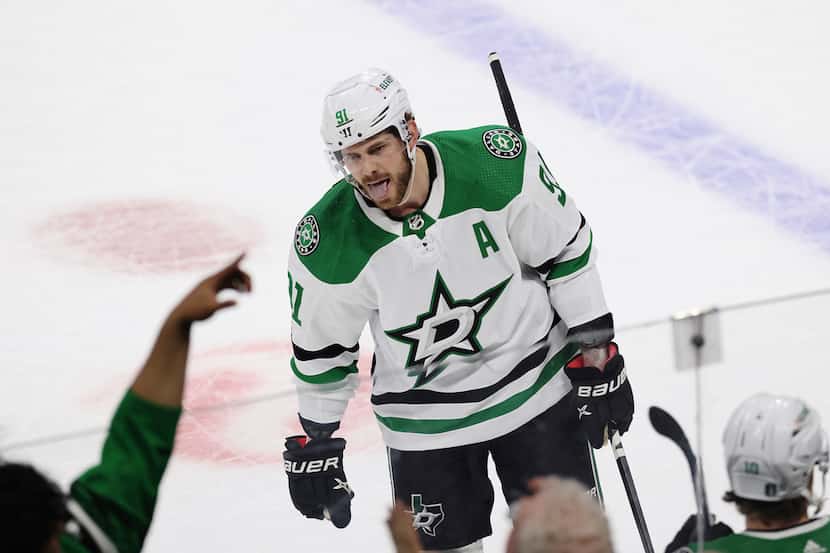Dallas Stars center Tyler Seguin (91) reacts after scoring a goal against the Minnesota Wild...