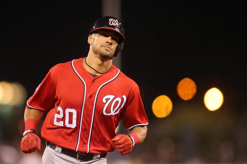 Washington Nationals shortstop Ian Desmond (20) rounds the bases after hitting a two run...