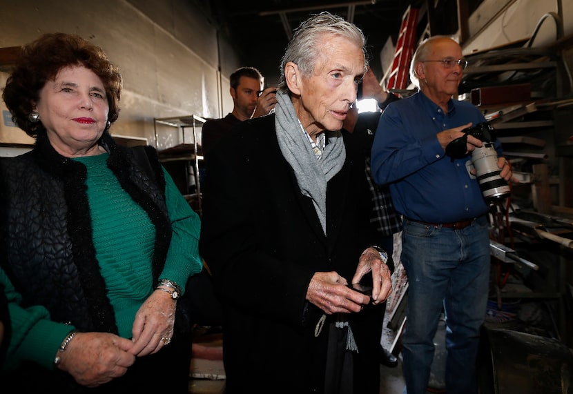 Patty Granville,Garland's director of cultural facilities, artist Barvo Walker (center) and...