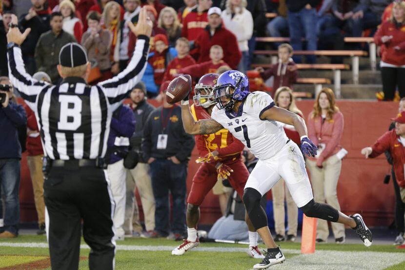 AMES, IA OCTOBER 17: Wide receiver Kolby Listenbee #7 of the TCU Horned Frogs celebrates...