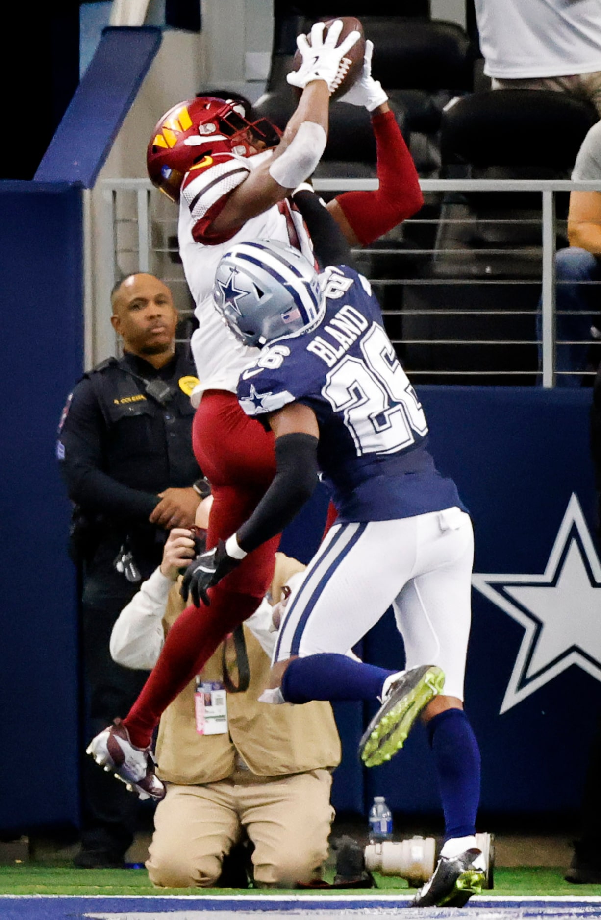 Washington Commanders wide receiver Terry McLaurin (17) goes up over Dallas Cowboys...