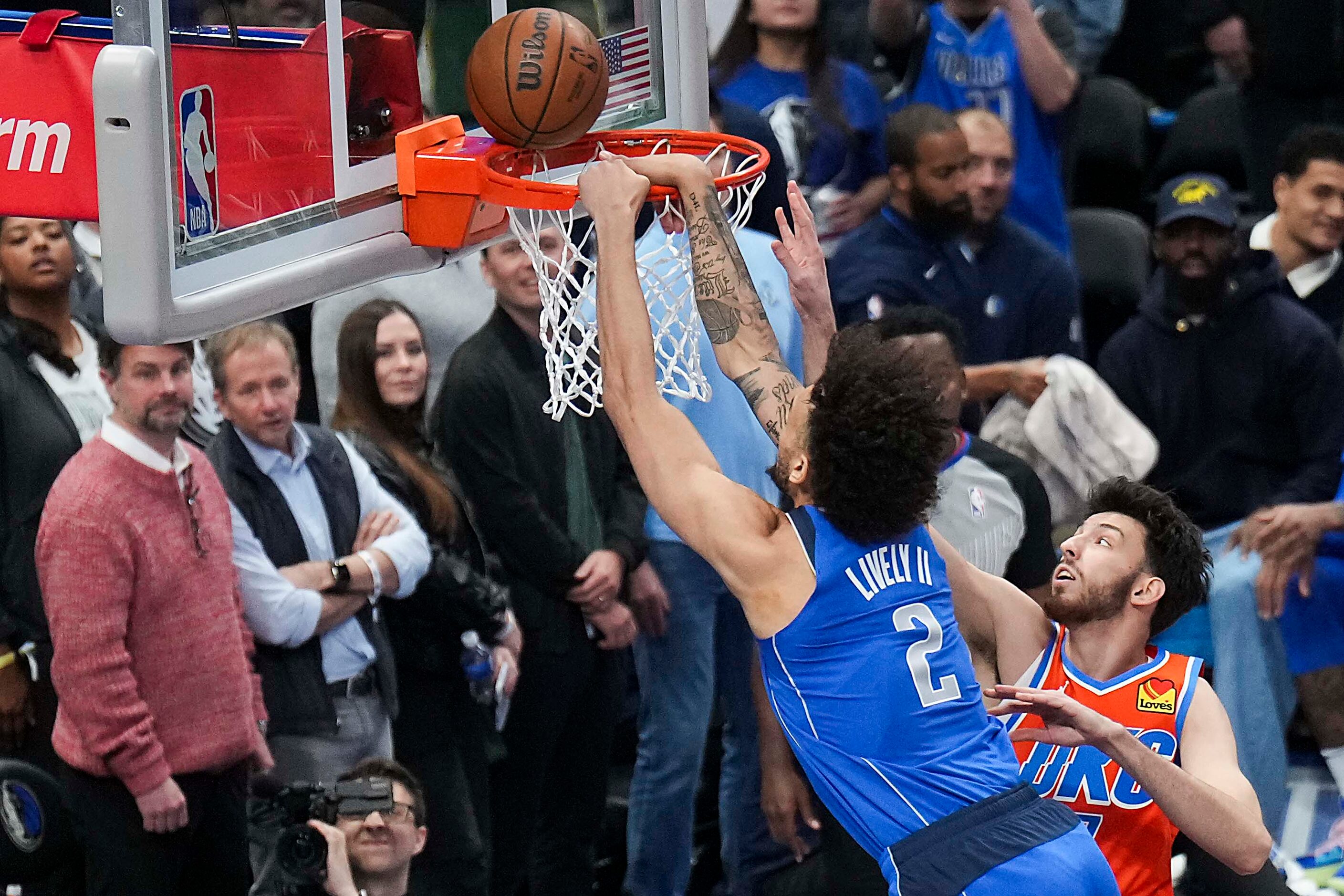 Dallas Mavericks center Dereck Lively II (2) misses on a dunk as Oklahoma City Thunder...