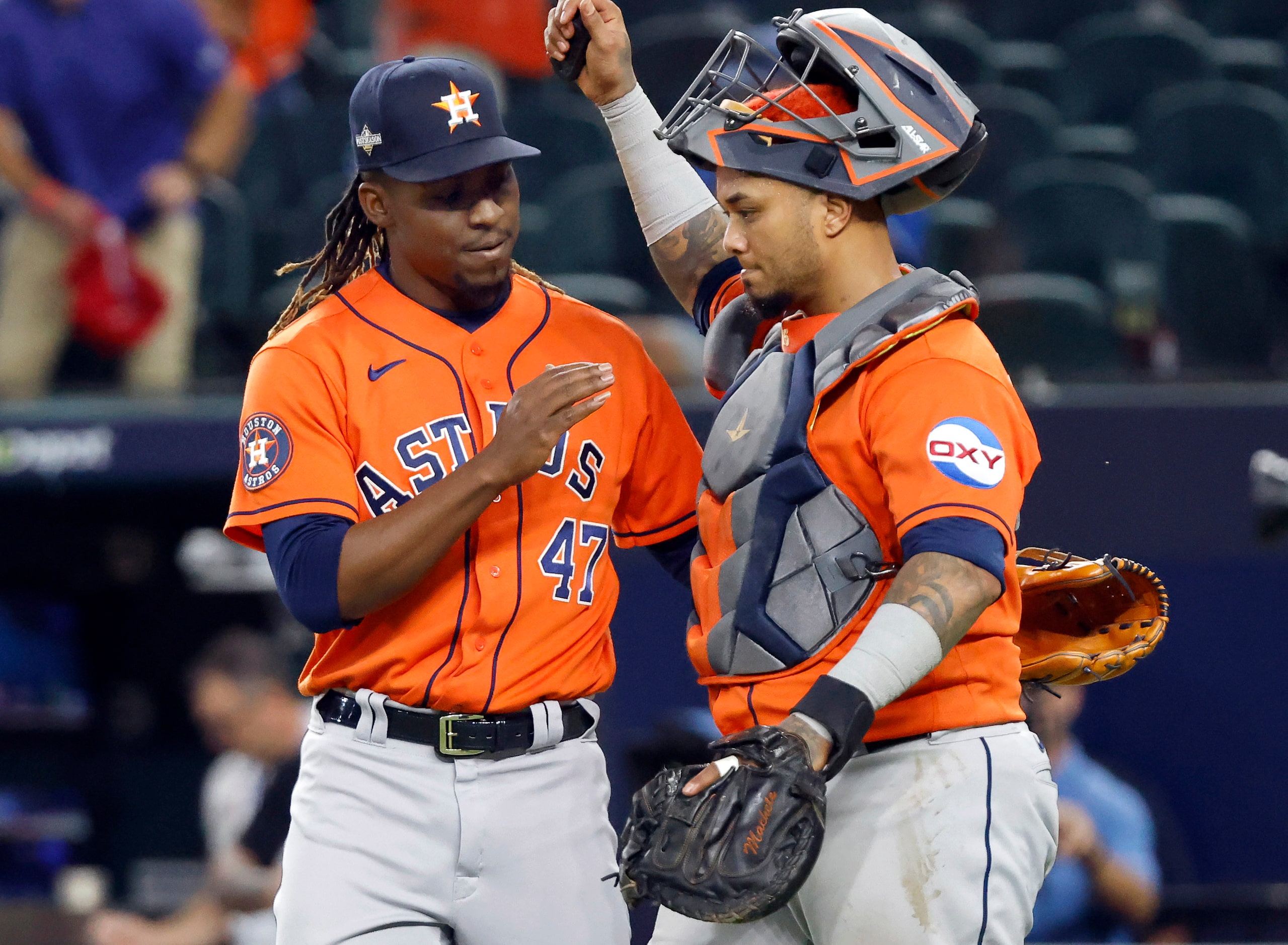 Houston Astros relief pitcher Rafael Montero (47) and catcher Martin Maldonado (15)...