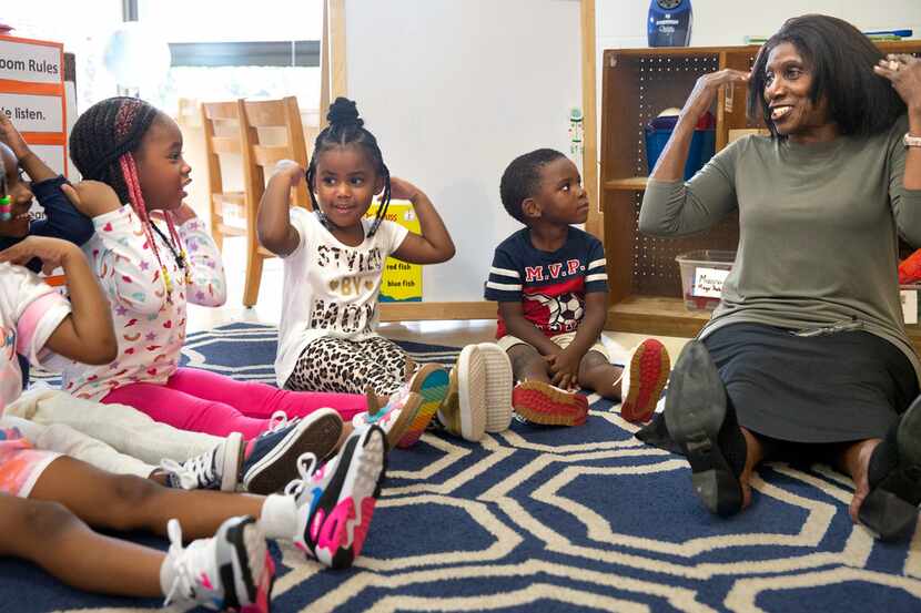 ChildCareGroup teacher Bobbie Blair joked with the children in her class at the Martin...