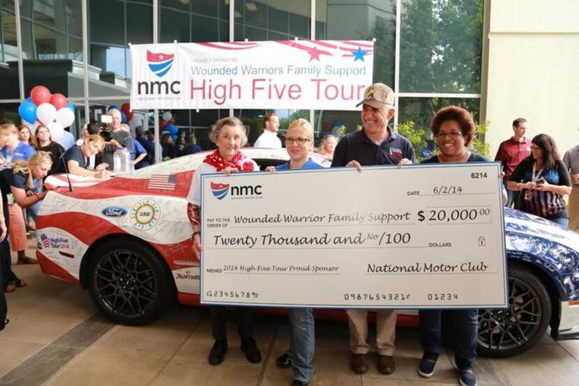 
Hughlene Stokes (from left), Heidi Vincent, Col. John Folsom and Donna Smith receives a...