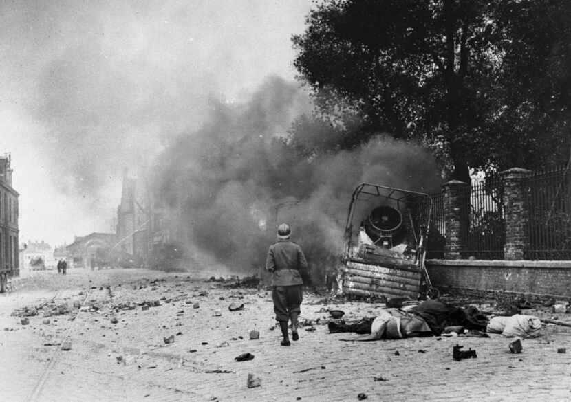 Smoke and debris in a street of Dunkirk, France,  June 1940.  (File Photo/The Associated Press)