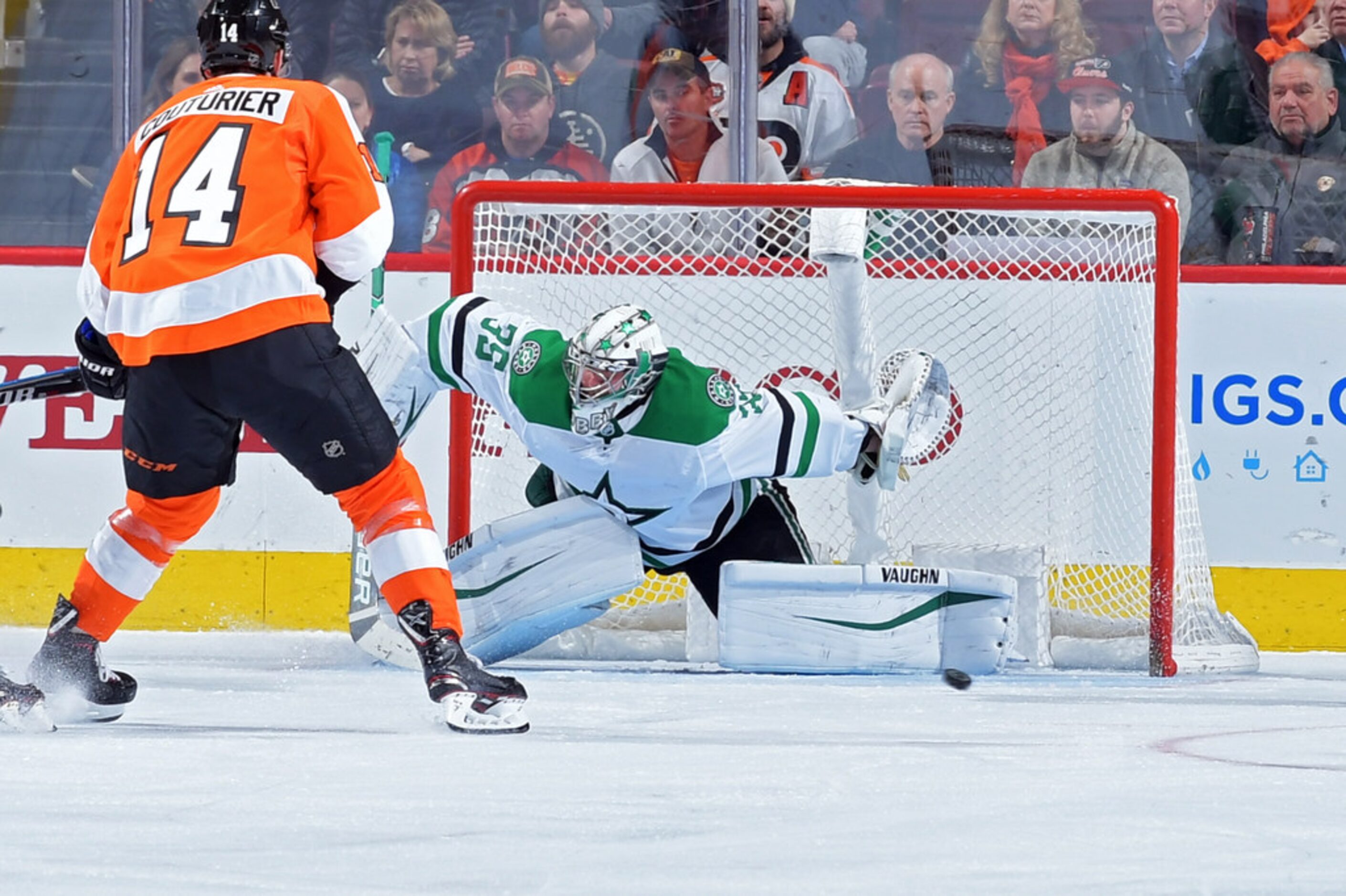 PHILADELPHIA, PENNSYLVANIA - JANUARY 10: Anton Khudobin #35 of the Dallas Stars drops to...