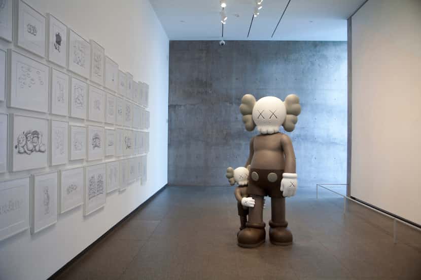 GOOD INTENTIONS, 2015, Bronze by Brooklyn-based artist KAWS at a major survey exhibition of...