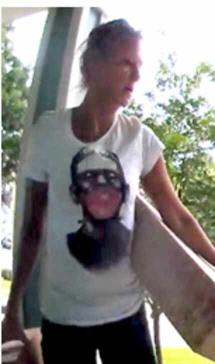 Police are trying to identify this woman accused of stealing packages from a porch in Dallas.