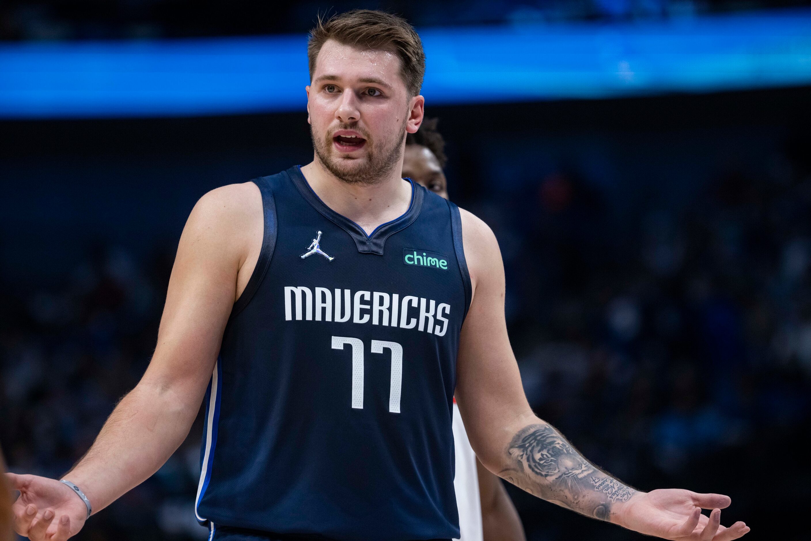 Dallas Mavericks guard Luka Dončić (77) reacts to a call during the first quarter of the...