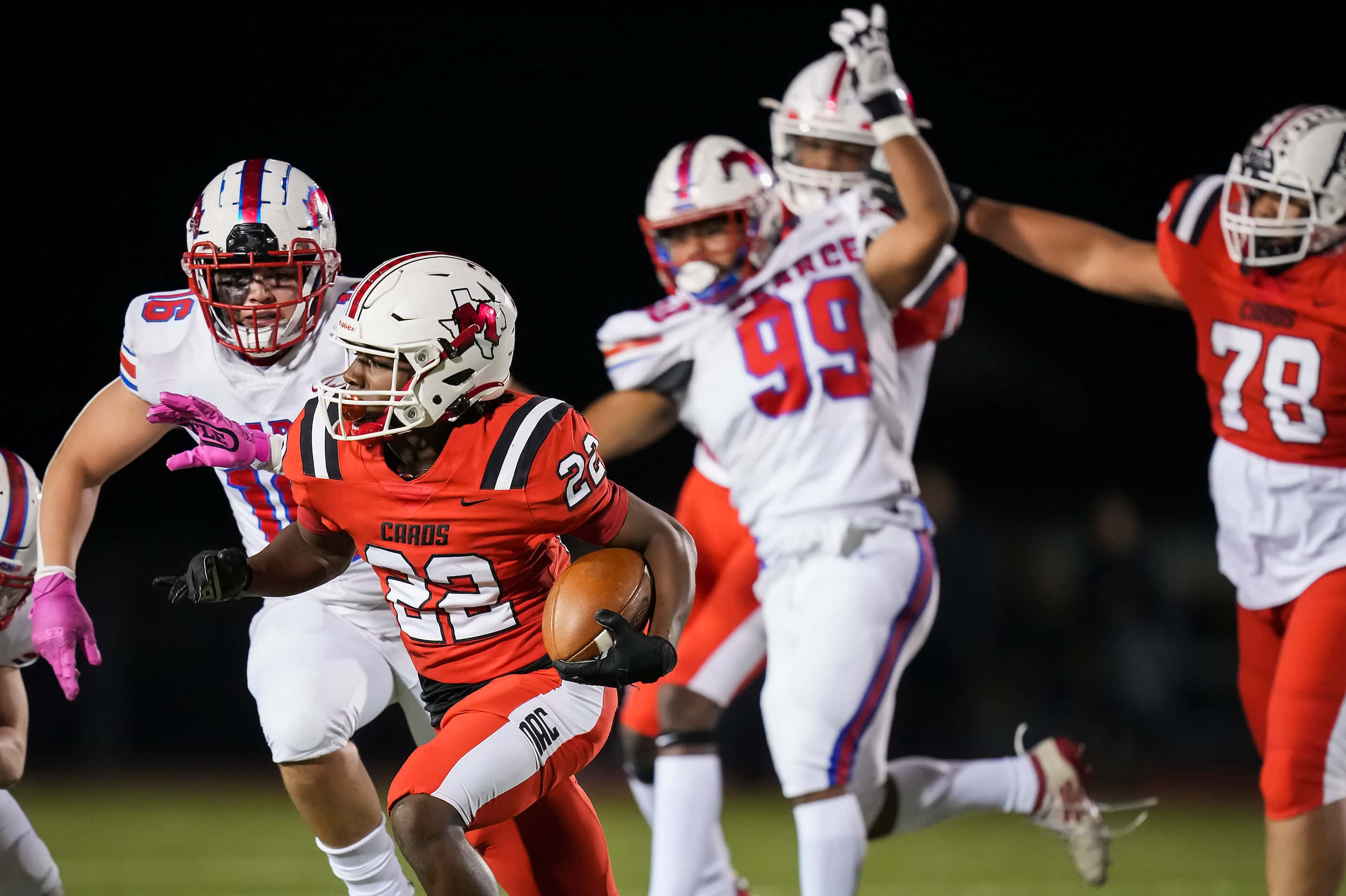 Irving MacArthur’s Jerbrandin Henderson (22) gets past Richardson JJ Pearce defenders...