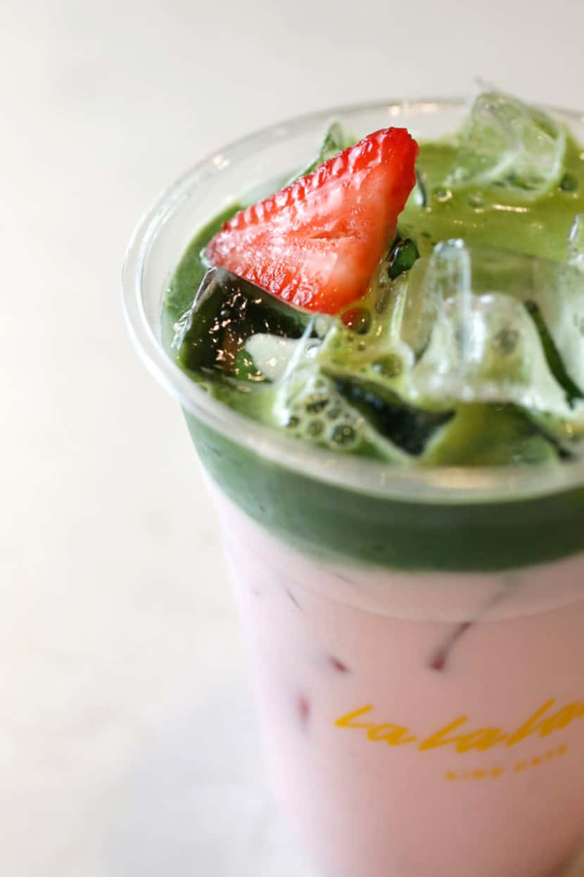 An iced Strawberry Fields latte with matcha, strawberry and beetroot 