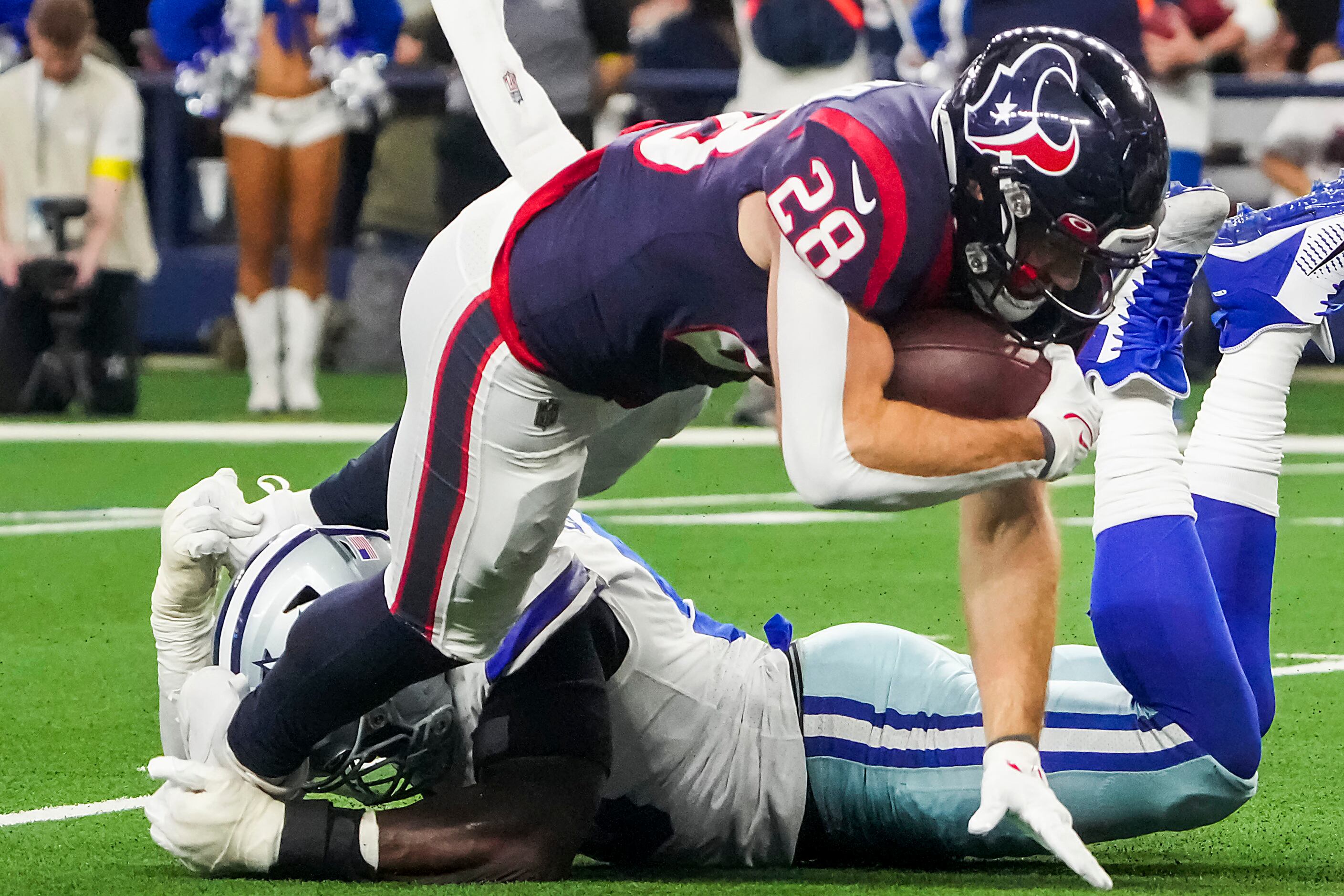 Houston Texans running back Rex Burkhead (28) walks on the