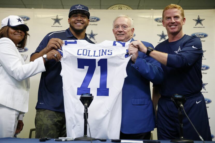 Standing with his mother, Loyetta Collins, former LSU offensive lineman La'el Collins is...