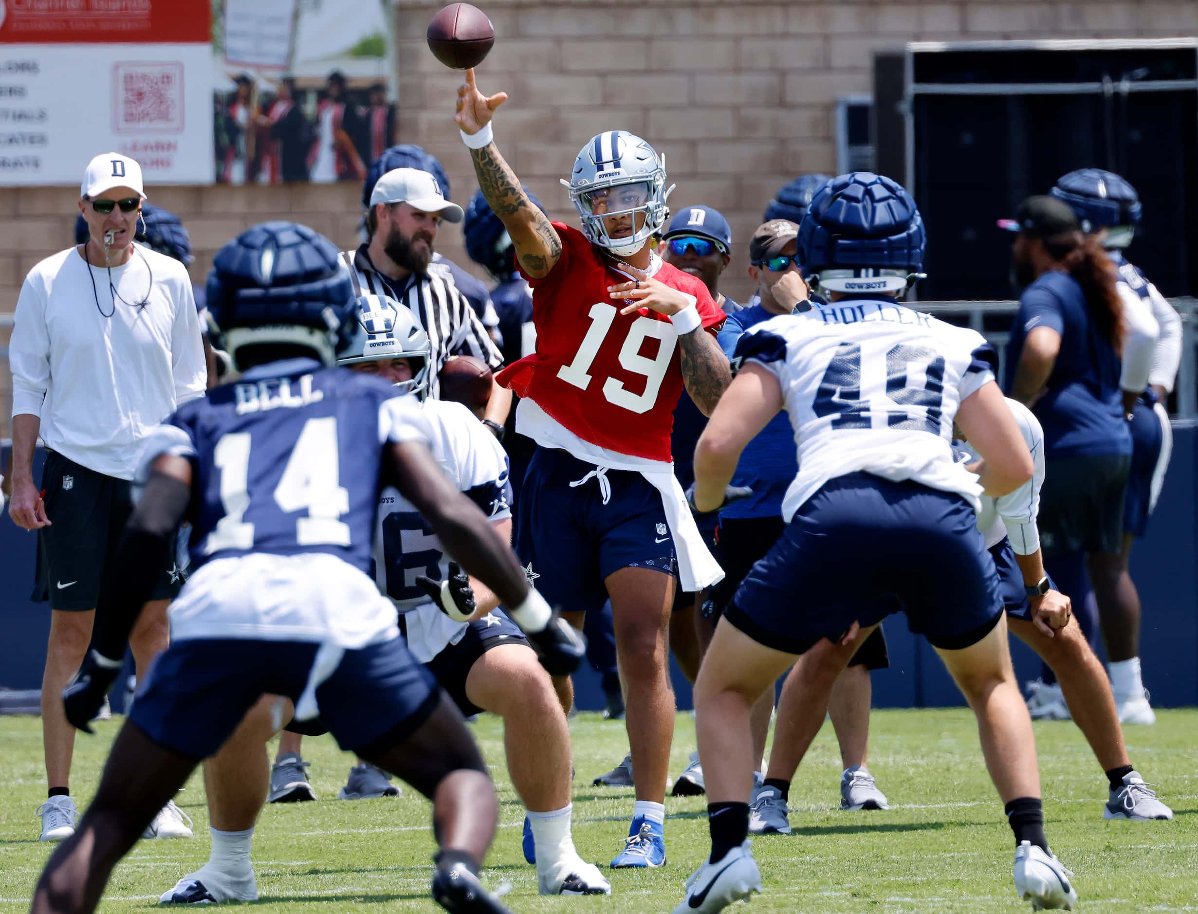 Dallas Cowboys quarterback Trey Lance (19) throws a pass into coverage during the opening...