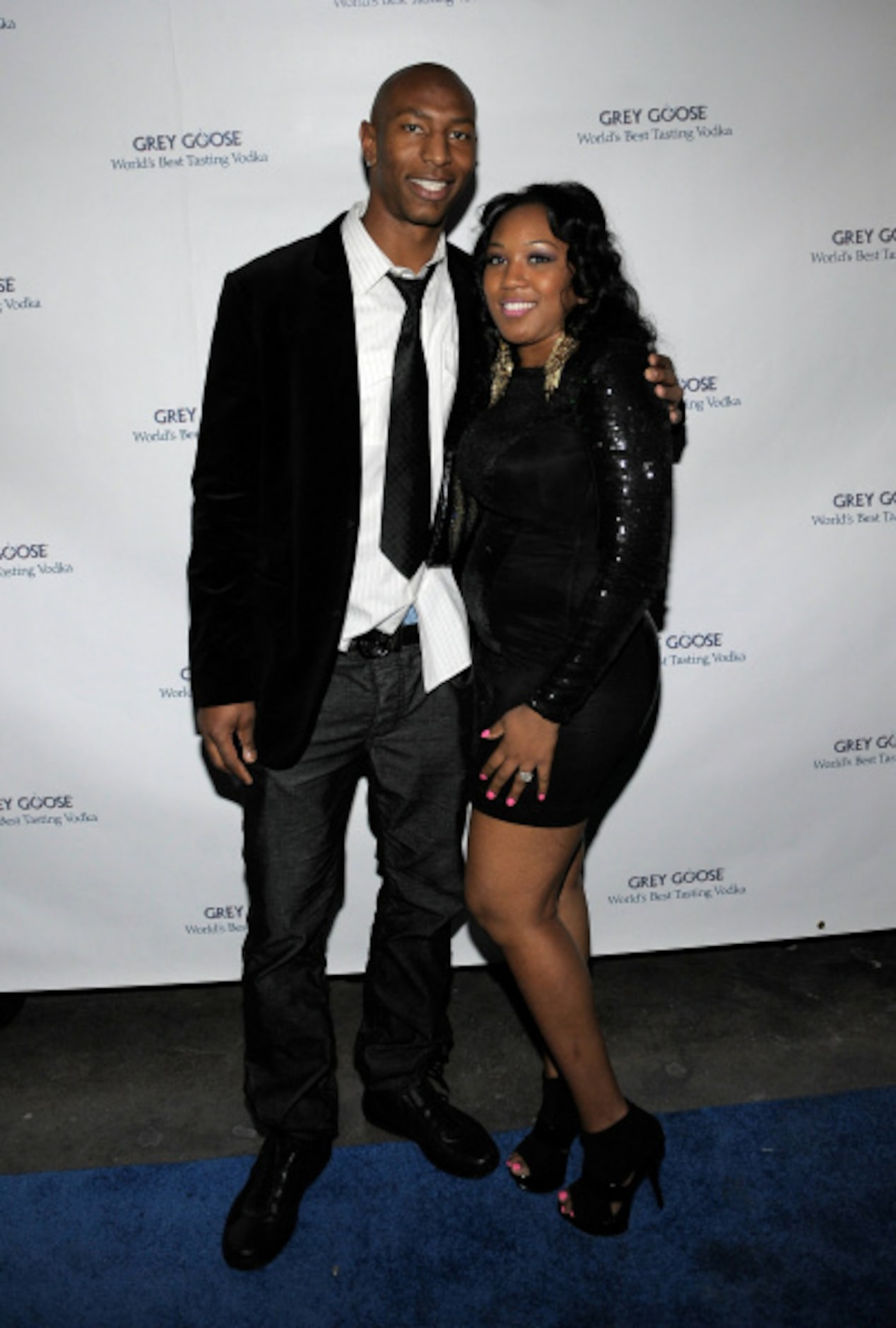 NFL player Sam Hurd of the Dallas Cowboys (L) and guest attend the GREY GOOSE lounge series...