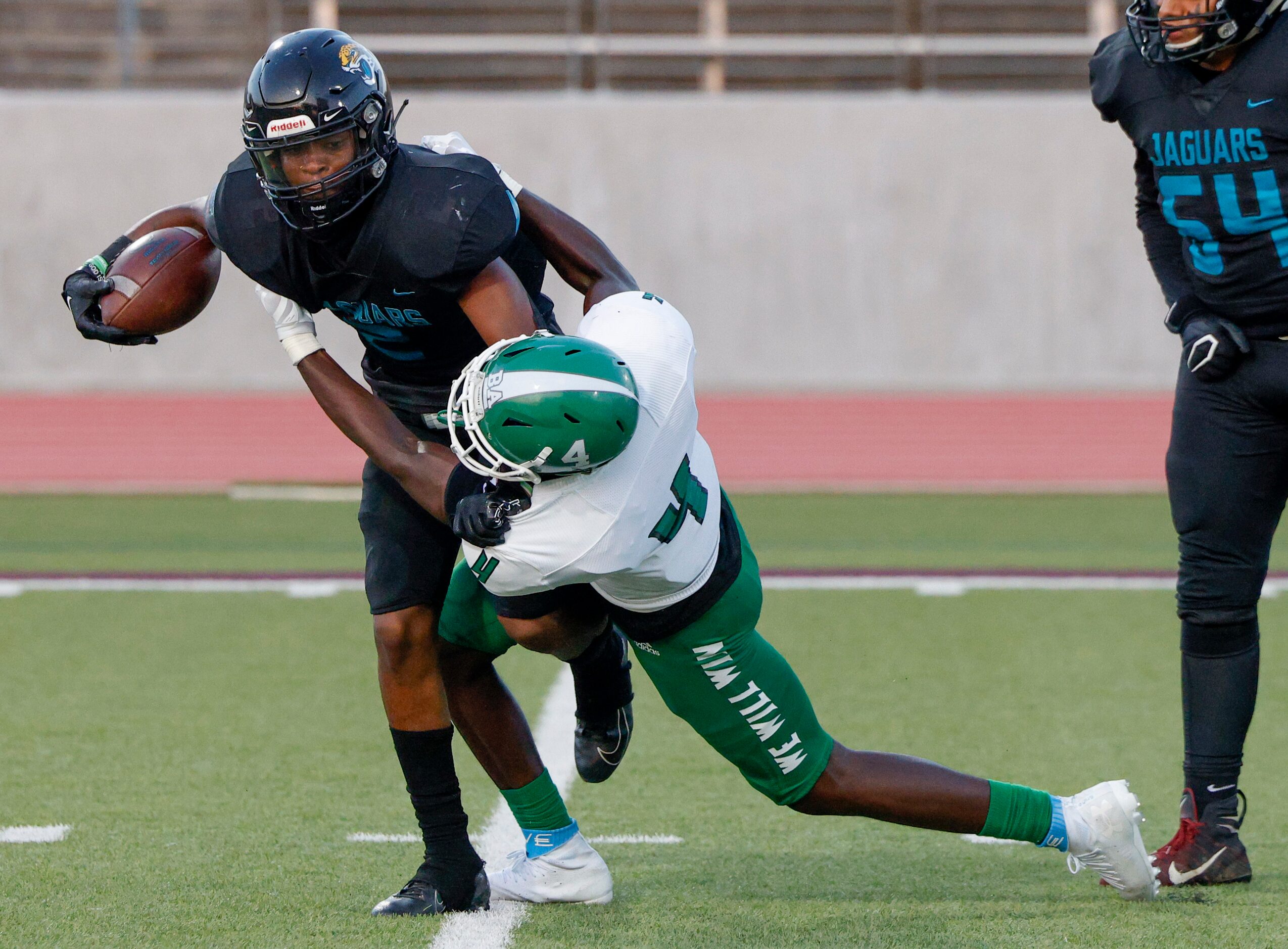 Bryan Adams defensive end Samson Milton (4) tackles Molina wide receiver Mikavion Jones (2)...