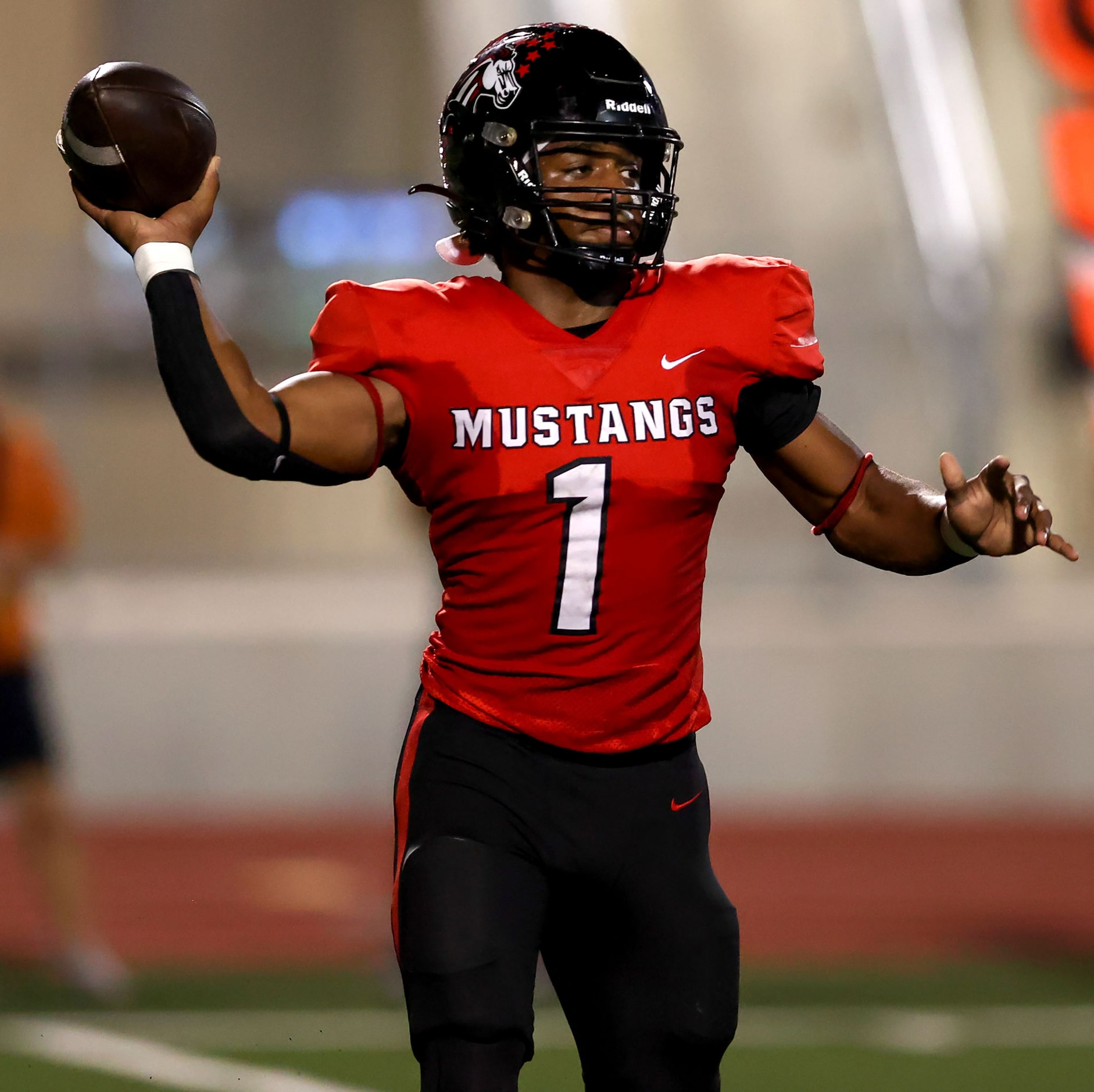 Creekview backup quarterback DeAndre Richardson looks to make a pass against W.T. White...